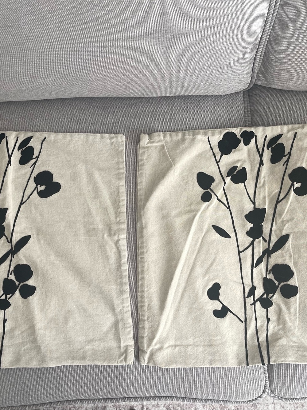 Pier 1 Black Floral Silhouette Pillow Covers on Cream
